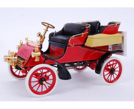 FRANKLIN MINT; An original 1:24 scale Franklin Mint precision diecast model 1903 Ford Model A veteran car. Within the origina