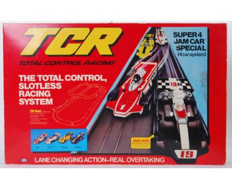 TCR: A vintage TCR Total Control Racing electric Scalextric style racing set. Appears to be complete, within a good original 