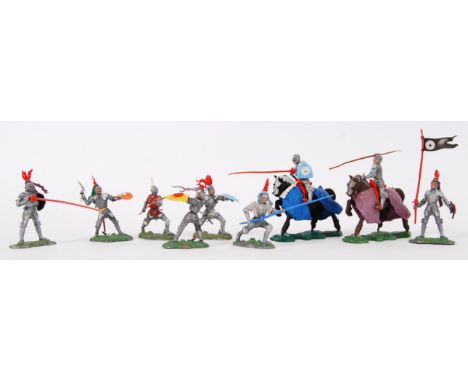 BRITAINS SWOPPETS: A collection of 9x unboxed vintage Britains Swoppet Knights, including two on horseback. Each marked to ba