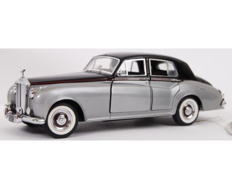 FRANKLIN MINT; An original 1:24 scale Franklin Mint precision diecast model 1955 Rolls Royce Cloud 1 car. Within the original