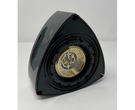 Stylish and unusual desk art/clock painted gloss black with quartz movement.Measuring 18cm and weighing 4.3 kg so could doubl