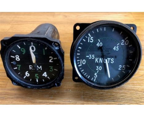 Alongside an original WWII Avro Lancaster rev counter gauge Mk IV B.The Spitfire airspeed indicator is as manufactured by 'Me