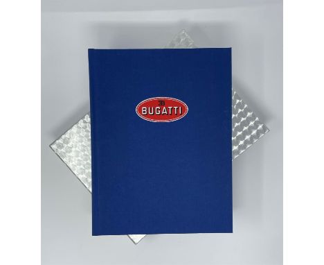 The Magnum Opus for all Bugatti enthusiasts."Chassis Plate" numbered 1264 on distinctive engine turned slipcase559 pages of i