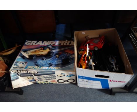 A SCALEXTRIC GRAND PRIX SET AND TRACK  and a Burago Ferrari F40