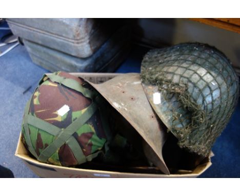 TWO MILITARY FUEL CANS, a tin helmet, two other helmets and other militaria