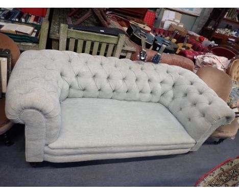 A VICTORIAN BUTTON BACK CHESTERFIELD upholstered in grey/blue material