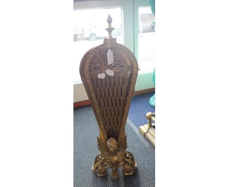 A BRASS FAN FIRESCREEN