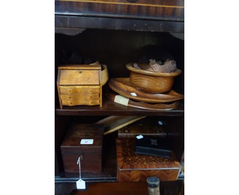 A FRENCH KINGWOOD PARQUETRY DECORATED BOX, a mahogany tea caddy, a Black Forest bear and other wooden items