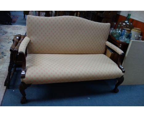 A REPRODUCTION MAHOGANY FRAMED CHIPPENDALE STYLE SETTEE, 150cm long