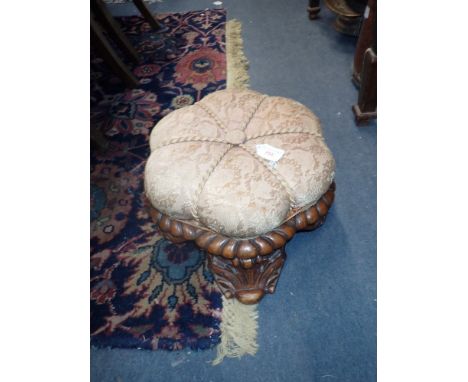 A VICTORIAN CARVED WALNUT STOOL