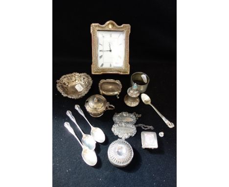 A SILVER FRAMED DRESSING TABLE CLOCK, together with a collection of sundries