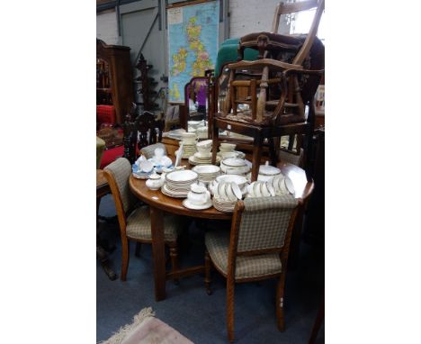 A LARGE LIGHT OAK 'CRICKET' STYLE TABLE, with a triangular base and circular top, 134cm dia. with a set of four Victorian oak