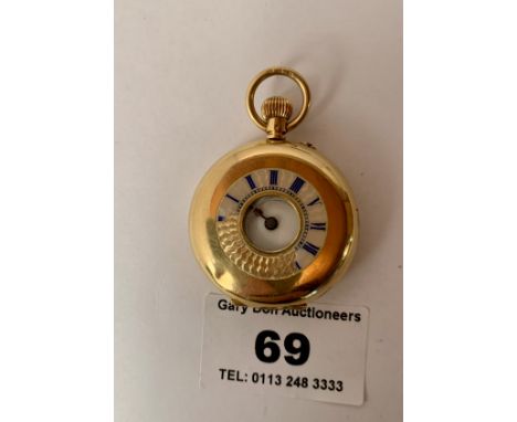18k gold half hunter fob watch, total w: 31.78 grams, 1.25” diameter, working, small dent on front, enamel missing