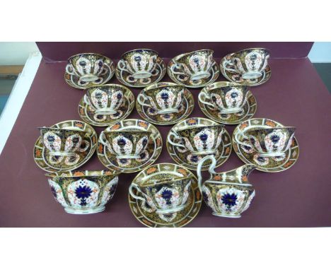 A set of twelve Royal Crown Derby Imari pattern tea cups, saucers, milk jug and sugar basin - dated 1919 