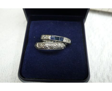 Platinum sapphire and diamond eternity ring together with 18 ct. white gold wedding band - both size N