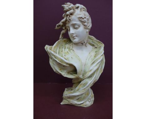 Art Nouveau porcelain head and shoulders of a girl with a bun and green scarf signed E. Stellura ? - ht. 12 ins 