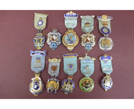Ten silver gilt enamel jewels by Spencer London for the Royal Masonic Institution for boys mostly Stewards various lodges 190