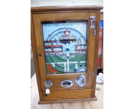 Win and place bagatelle penny slot machine in working order oak case, height 28ins X 20ins 