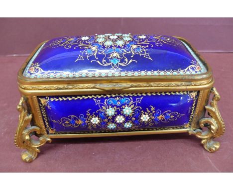 Early 20thC French ormolu and blue enamel musical jewel casket with floral decoration to top and sides on scroll legs - 6.25 