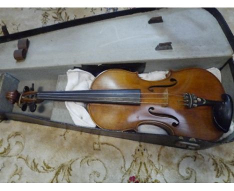 A full size German violin of Guarneri type, two piece back, cased 37.5cm