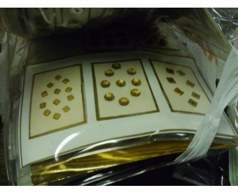 Nine sheets of early to mid-20th century glass metal and enamel buttons including shirt and glove buttons