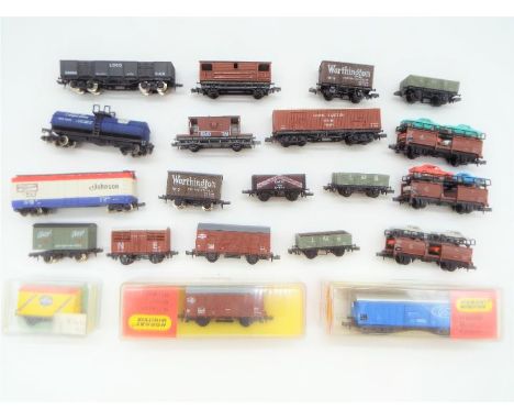 Hornby Minitrix, Graham Farish - 21 x N gauge Rolling Stock items to include car transporters, goods wagons, tanker, and othe
