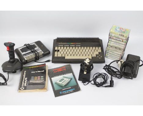 Commodore plus/4 - Retro Computing - Retro Gaming - A Commodore Plus/4 computer with power cables, Datassette included, Commo