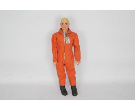 Palitoy, Action Man - An unboxed vintage Palitoy Action Man Pilot figure. The blonde painted hard head figure is marked 'Made