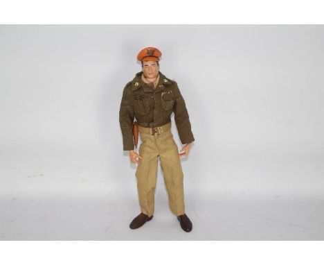 Palitoy, Action Man - An unboxed Palitoy Action Man in US Army Officer outfit. The black painted hard head Action Man is mark