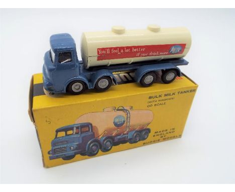 Budgie Toys - an OO scale die-cast Bulk Milk Tanker with windows # 292, cream tan on blue chassis and cab, appears ex+ to nm-