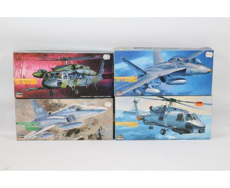 Hasegawa - Four boxed 1:72 scale plastic military aircraft model kits. Lot consists of TF-18A Hornet; Northrop F-20 Tigershar