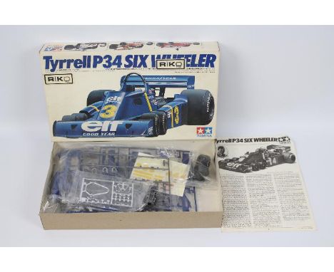 Tamiya - A boxed Tamiya #GC2001 1:20 scale 'Grand Prix Collection Series'  Tyrell P34 Six Wheeler plastic model kit. The majo