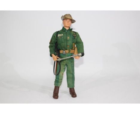 GI Joe, Hasbro - An unboxed vintage Hasbro GI Joe action figure in Marine Jungle Fighter outfit. The red painted hard head fi