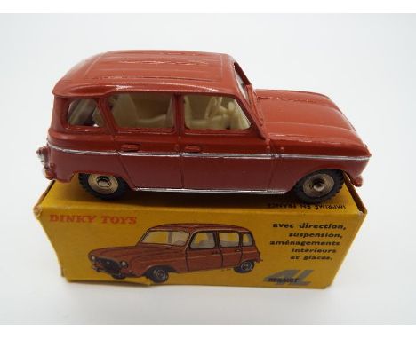 Dinky (French) - a Renault 4L with direction, suspension, interior fittings and windows # 518, brown body with silver detaili