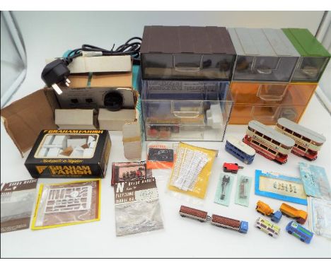 N gauge - a good mixed lot to include 3 x diecast trams, motor vehicles, figures, trackside signals, a Graham Farish mint box