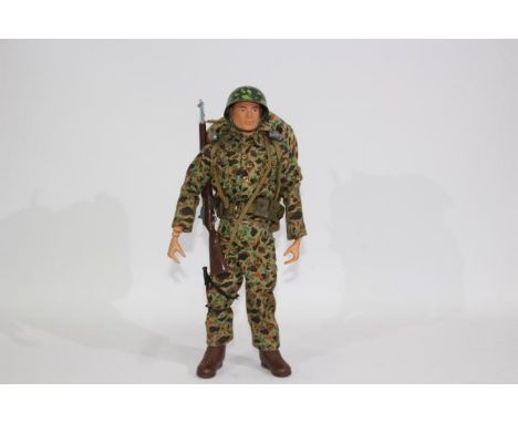 GI Joe, Hasbro - An unboxed vintage Hasbro GI Joe action figure in Beachhead Attack outfit. The red painted hard head figure 