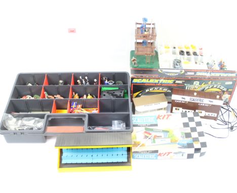 Scalextric - A group of 4 unboxed vintage Scalextric buildings and a boxed C700 Dunlop Bridge , with two storage boxes of Sca