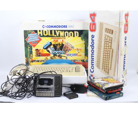 Commodore 64 - 64C personal computer with datasette, PSU, quick shot joy-stick, RF cable, International Soccer (Cartridge Ver