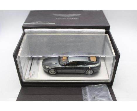 Tecnomodel - A limited edition Aston Martin Rapide in 1:43 scale in Meteorite Silver # T-EX05E. This car is number 85 out of 