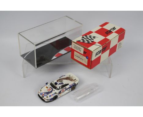 Starter - A hand built resin Porsche 911 GT1 1996 Brands Hatch winning car in 1:43 scale # POR184. The car appears in Fair co