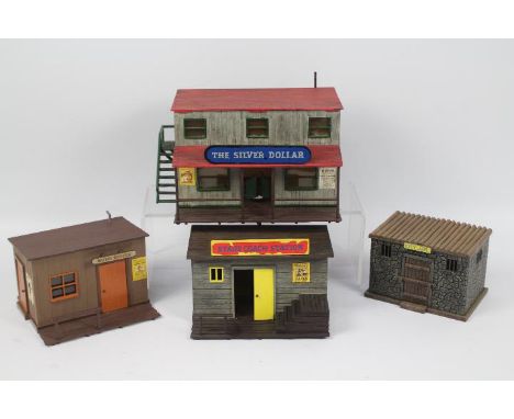 Timpo - A group of four unboxed Wild West themed plastic assembled buildings by Timpo. Lot consists of 'The Silver Dollar'; '