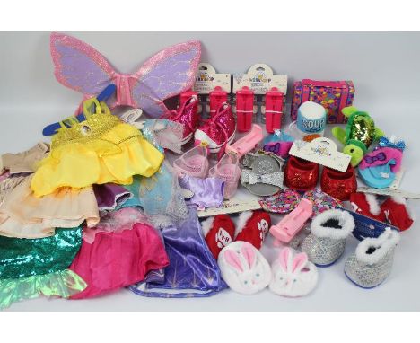 Build-a-Bear - A collection of Build-a-Bear clothes and accessories - Lot includes 7 x dresses, 4 x pairs of roller skating s