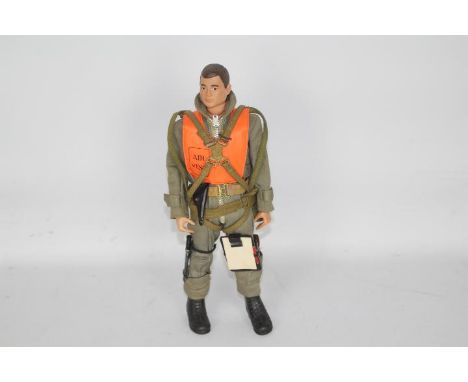 Palitoy, Action Man - An unboxed vintage Palitoy Action Man figure in Scramble Pilot outfit. The brown painted hard head figu