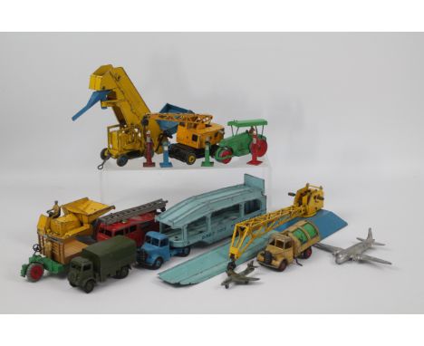 Dinky - A collection of 12 x vehicles including Bedford Pullmore Car Transporter with loading ram # 582, Army Wagon # 623, Go
