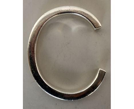 A Mexican silver bangle hallmarked 925, 0.9oz