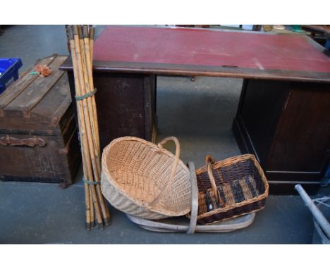 Two wicker baskets and a vintage trug together with a 10 piece bamboo drain rod set