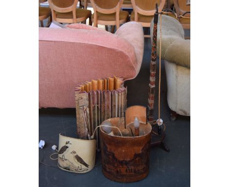 A quantity of vintage lamps and shades including two table lamps with metal bases and decorative shades, a standing lamp with