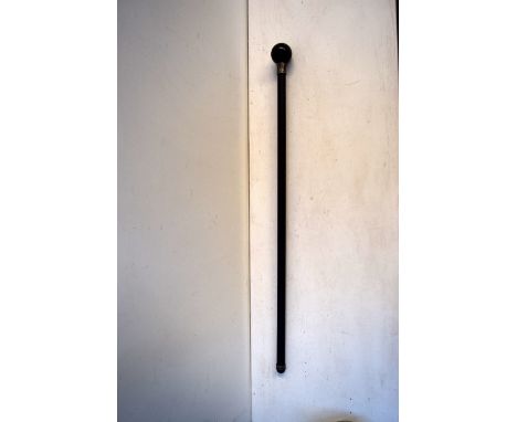 A walking stick with a snooker eight ball top 88cmL