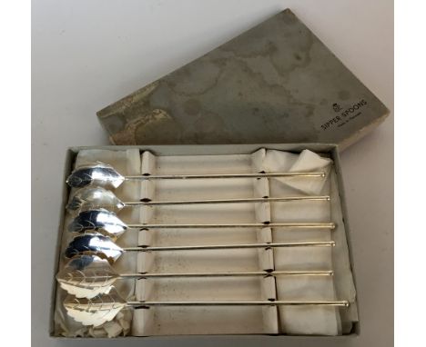 Six Sterling silver sipper spoons-made in Denmark in original box, engraved 625 Denmark with leaf motif together with a set o