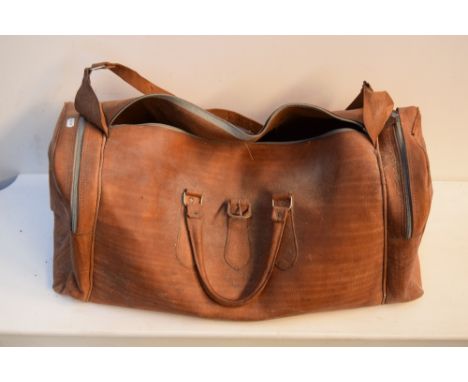A vintage leather flight bag